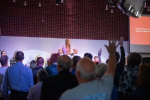 Congregation worshipping