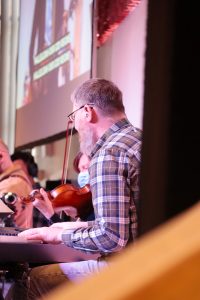 Musicians in worship band
