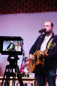 Sam leading worship